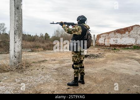 A Russian special forces soldier holds assault rifle assault rifle in his hands. military exercises in army. Stock Photo