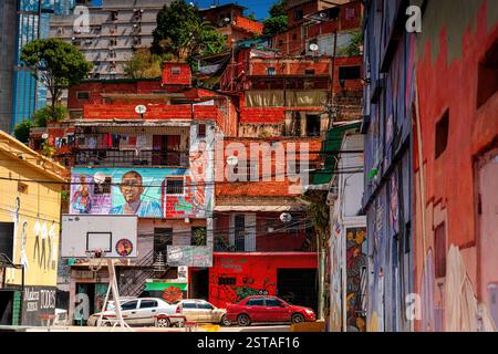 Poor neighborhood in Caracas, Venezuela. Slums in South Latin. Basketball court and brick houses Stock Photo