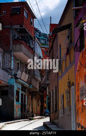 Typical narrow street in a poor shanty town in Caracas, Venezuela. Stock Photo