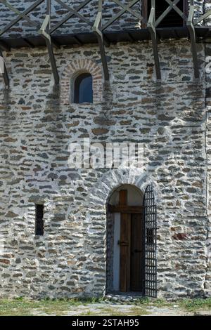 Entrance to the medieval stone wall building Stock Photo