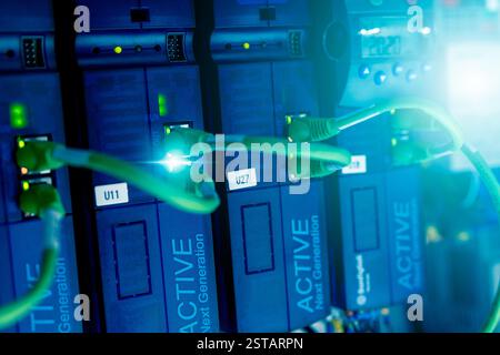 Advanced industrial inverter controller system optimizes manufacturing equipment performance in modern factory. Precise automation control for increas Stock Photo