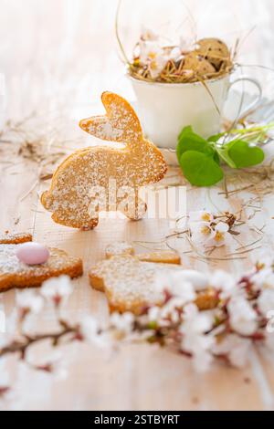 Homemade almond bunny cookies for Easter with Easter eggs Stock Photo