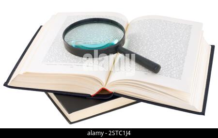 Open book and magnifier on a white background Stock Photo - Alamy