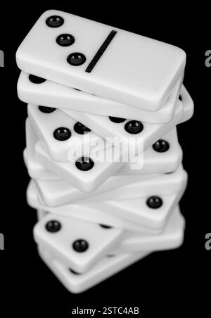 Pile from dominoes on black background Stock Photo