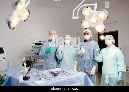 Group of doctors discussing patient cases around table. Stock Photo