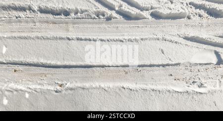 panorama view from above on texture of snow covered road in the winter forest Stock Photo