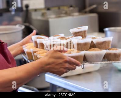 woman preparing cakes in kitchen Stock Photo