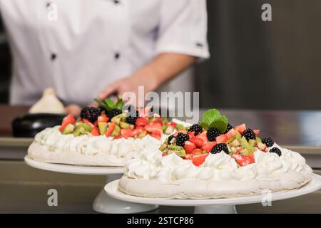 woman preparing cakes in kitchen Stock Photo