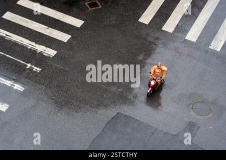 Pedestrians crossing a crosswalk in Thailand Stock Photo