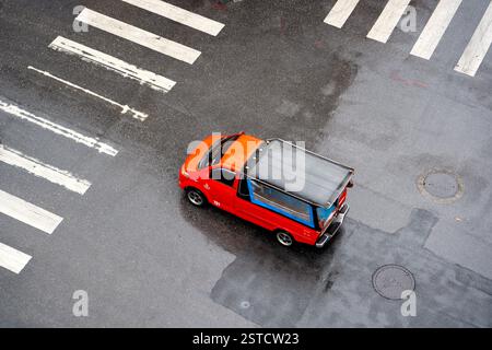 Pedestrians crossing a crosswalk in Thailand Stock Photo