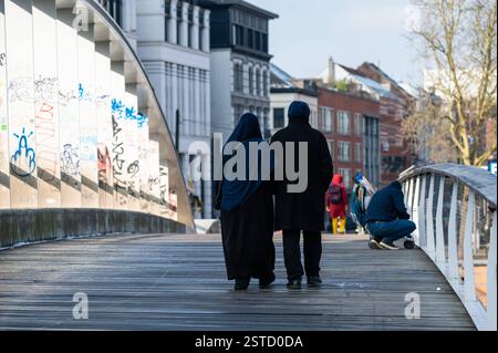 People walking over the Suzan Daniel bridge in Brussels Capital Region ...