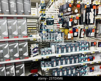 Lviv, Ukraine - February 16, 2025: Retail aisle with boxes of LED lights and accessories displayed for sale Stock Photo