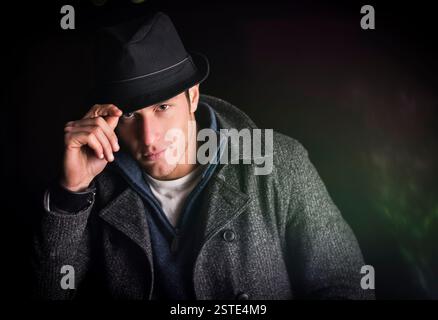 Attractive young man at night Stock Photo
