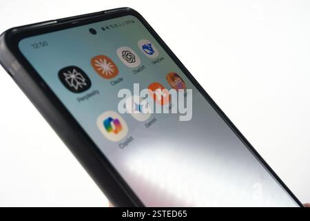 Sleman, Indonesia - February 2025, 15: Close-up smartphone's display showing icons of popular AI applications Including DeepSeek, ChatGPT, Claide, Cop Stock Photo