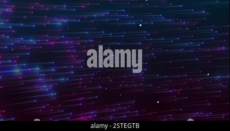 Colorful light streaks and particles moving in circular patterns, image over dark background Stock Photo