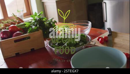 Vegan food image over fresh vegetables and kitchen utensils on wooden table Stock Photo