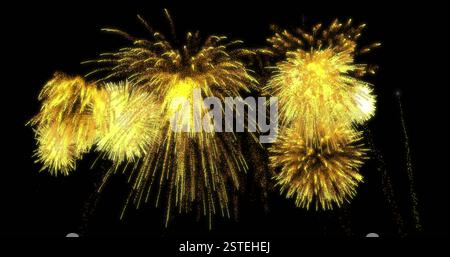 Fireworks image with bright yellow and gold bursts against black background Stock Photo