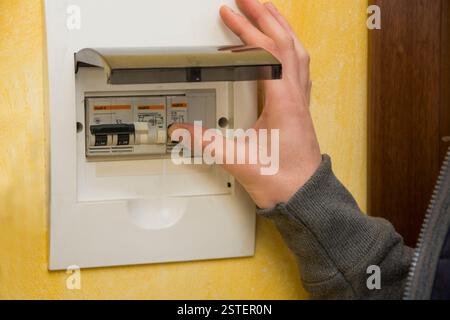 Male hand using an electronic control panel Stock Photo