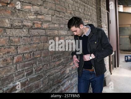 Confident man posing in selvedge  jeans Stock Photo