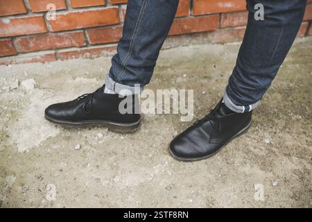 Confident man posing in selvedge  jeans Stock Photo