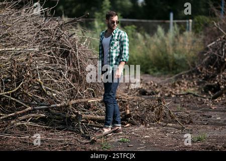 Confident man posing in selvedge  jeans Stock Photo