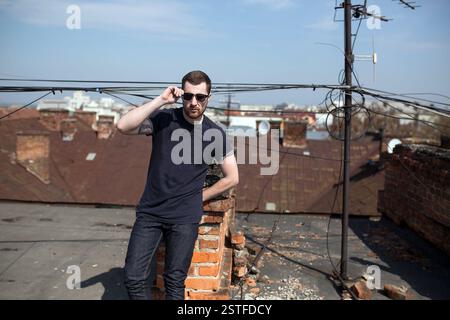 Confident man posing in selvedge  jeans Stock Photo