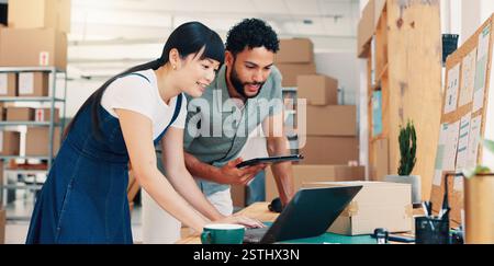 Team, laptop and business people in discussion for shipping, warehouse or delivery schedule. Distribution, planning and workers in ecommerce startup Stock Photo
