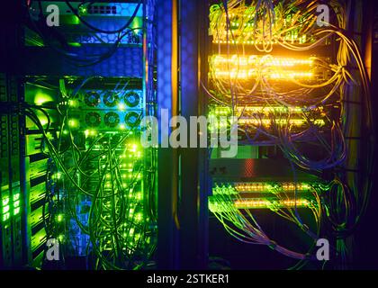 Close-up of hard drives and cables in data center Stock Photo