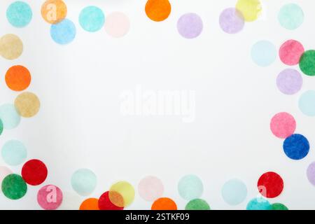 Colorful confetti frame on white background Stock Photo