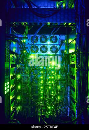 Close-up of hard drives and cables in data center Stock Photo