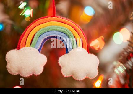 Hand made rainbow and clouds Christmas ornament Stock Photo
