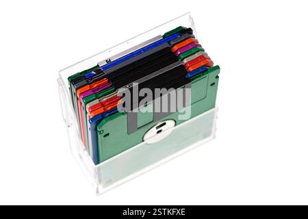 A pack of vintage computer colored floppy disks Isolated on white. Old technologies. Selective focus Stock Photo