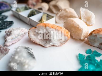 Collection of beautiful precious stones on white table. Stock Photo