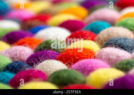 Multicolored felt ball rug detail Stock Photo