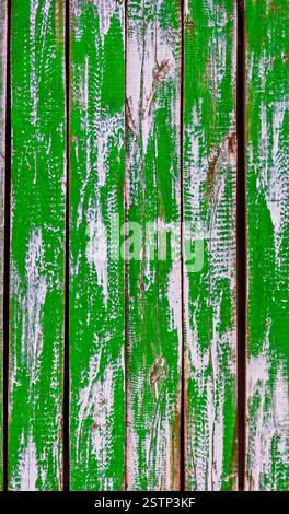 Old planks painted in green and white colors Stock Photo