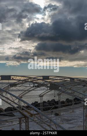 Clouds over the winter sea Stock Photo