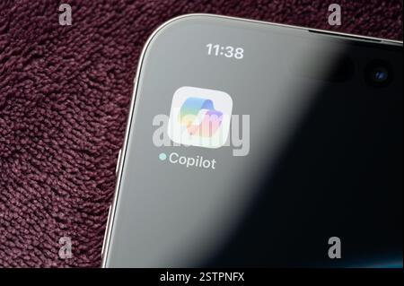 New York, USA - February 19, 2025: Copilot AI Assistant icon on smartphone screen close up view Stock Photo