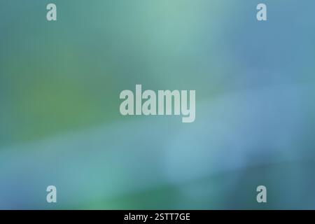Soft blurred gradient of teal and green hues creating a serene and calming abstract background Stock Photo