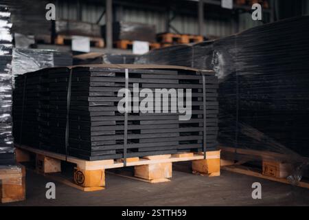 Stack of industrial metal grating on a pallet in a warehouse Stock Photo