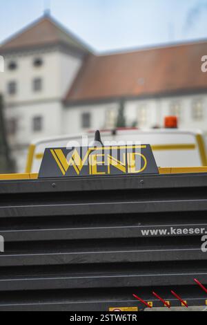 Close-up of a vehicle with Wend lettering and building in the background, Wend Glasfasermontage installing conduits for fibre optic cables, Messkirch Stock Photo