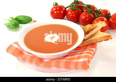 Mediterranean Tomato soup with basil and spices Stock Photo - Alamy
