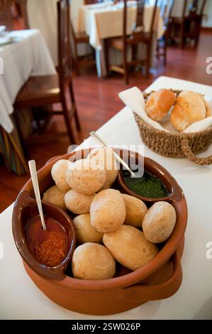 Ration of papas arrugadas with two mojo sauces in a Canarian restaurant. Madrid, Spain. Stock Photo