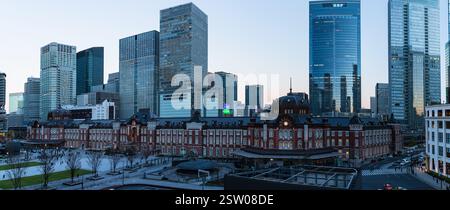Tokyo station buildings made of red bricks and high-rise buildings as seen from the Marunouchi Building in Chiyoda-ku, Tokyo, Japan Stock Photo