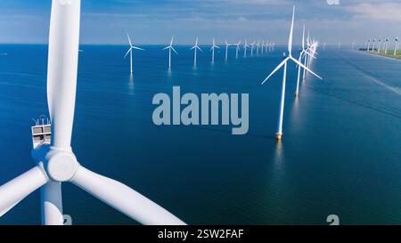 Breathtaking Aerial View of Windmill Turbines in Flevoland, Netherlands - Embracing Green Energy Stock Photo