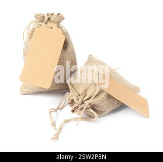 Two burlap bags with tags isolated on white Stock Photo