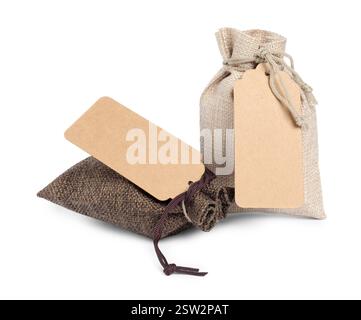 Burlap bags with tags isolated on white Stock Photo