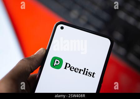 Dhaka, Bangladesh- 16 Sep 2024: Peerlist logo is displayed on smartphone. Peerlist is a professional network where you can showc Stock Photo