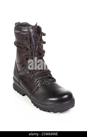 Detailed view of sturdy black military  boots. Features included rugged soles, a solid build, and lace-up design. Stock Photo