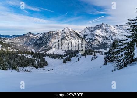 Winter hiking in the snow covered Alps near Oberstdorf and Sonthofen in Bavarian Allgau Stock Photo