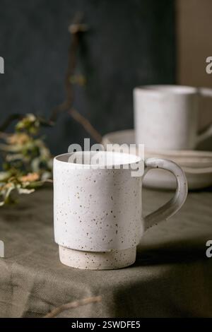 Set of empty craft ceramic coffee cups Stock Photo